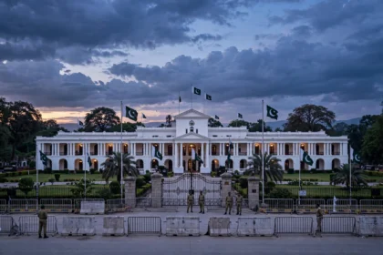 Governor House in Peshawar at dusk as Faisal Karim Kundi's 11-member advisory council takes charge under governor's rule in Khyber Pakhtunkhwa in October 2026