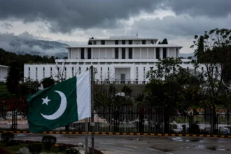 Aiwan-e-Sadr in Islamabad with the Pakistani flag after President Zardari signed the emergency proclamation for Khyber Pakhtunkhwa under Articles 232 and 234 October 2026