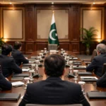 A high-level federal government committee meeting in Islamabad with the Pakistani flag as Prime Minister Shehbaz Sharif forms an 11-member committee led by Ishaq Dar to monitor KP affairs in October 2026